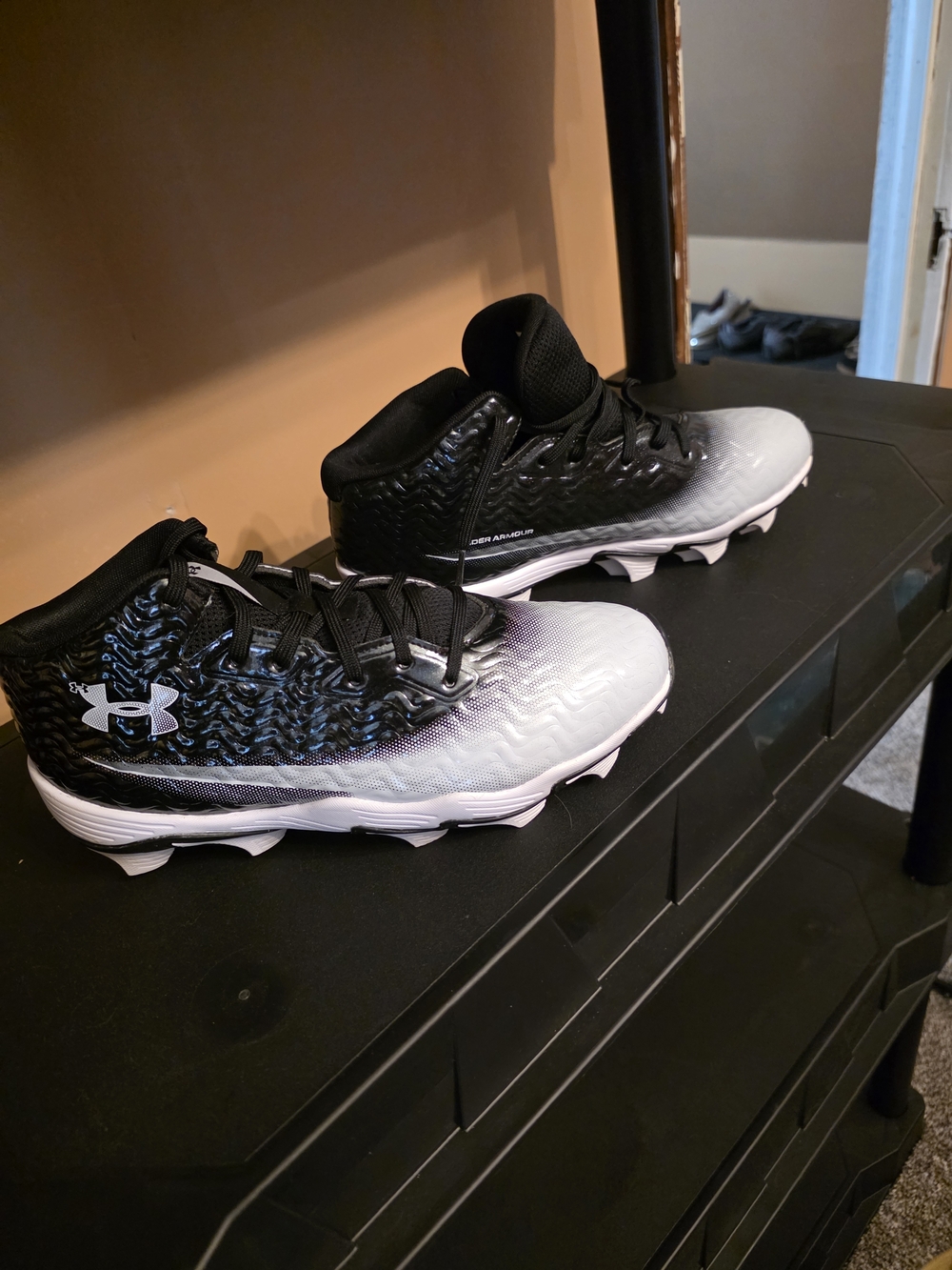 Under Armour Black and White Gradient Cleats Sneakers